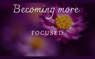 TEXT BECOMING MORE FOCUSED WITH PURPLE BACKGROUND AND YELLOW FLOWER