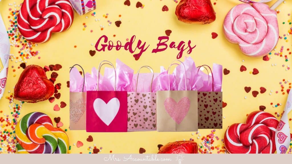 IMAGE OF VARIOUS VALENTINE'S THEMED CANDIES AND GOODY BAGS WITH THE TEXT GOODY BAGS